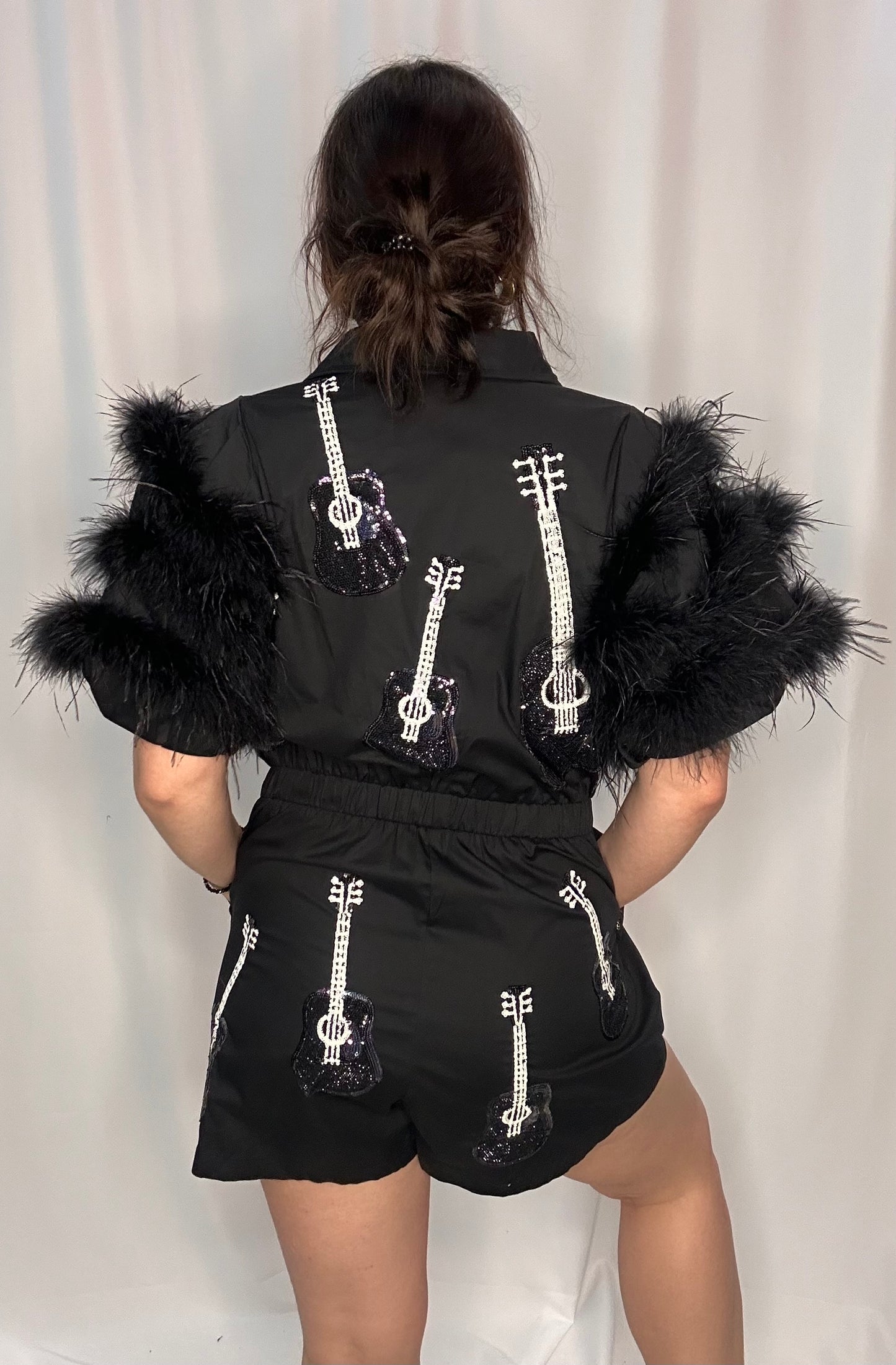 Queen Of Sparkle Black Guitar Feather Sleeve Romper