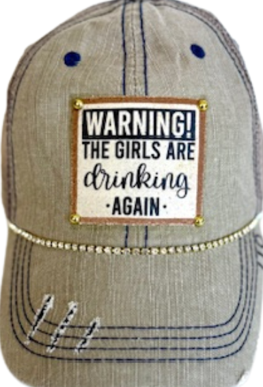 "WARNING..GIRLS DRINKING AGAIN" DISTRESSED TRUCKER HAT : BLING / TAN