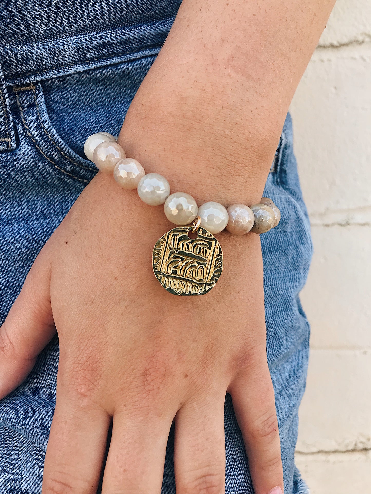 Coated Sunstone Bracelet // Tibetan Charm