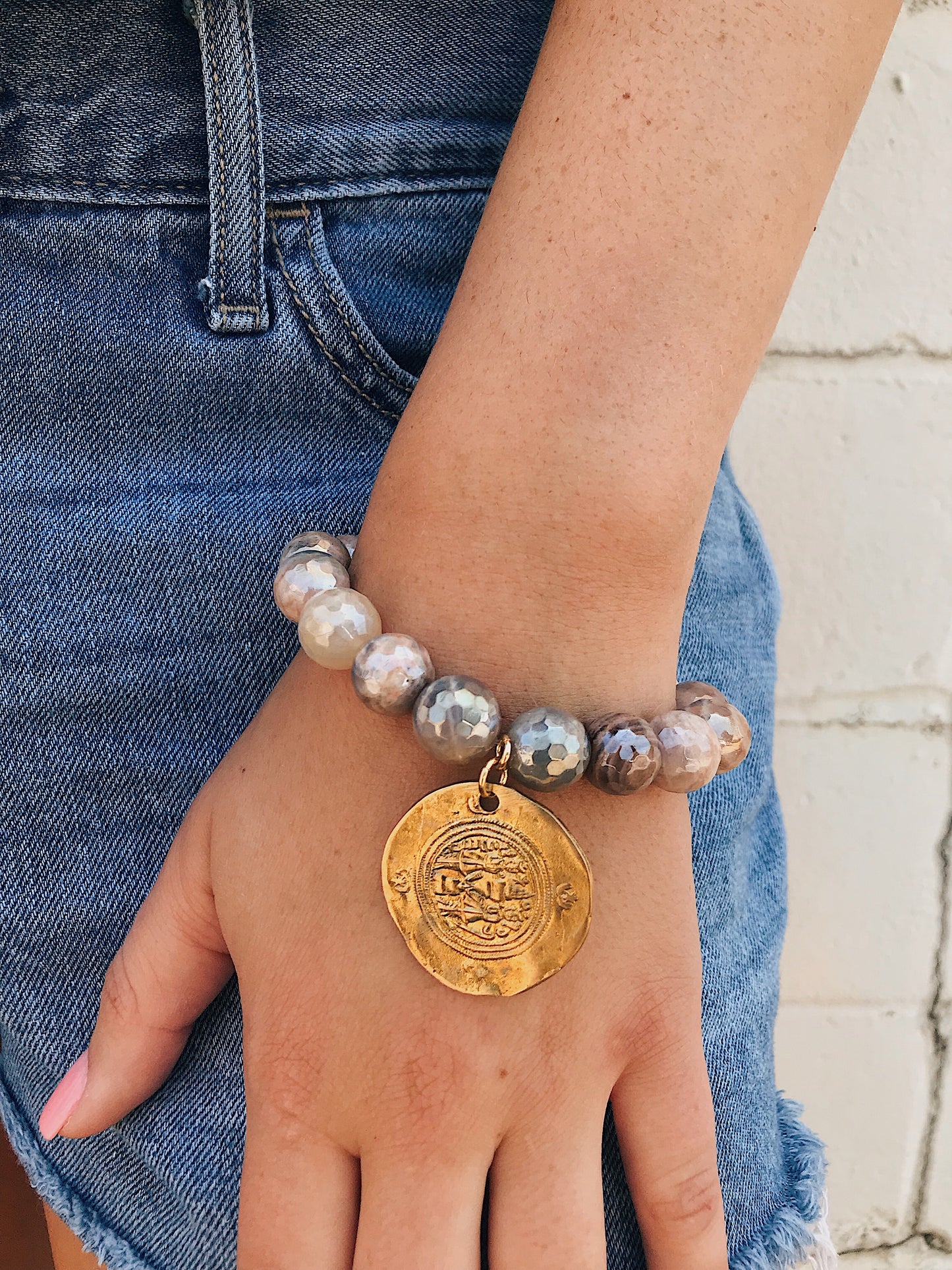 Coated Sunstone Bracelet // Tibetan Charm