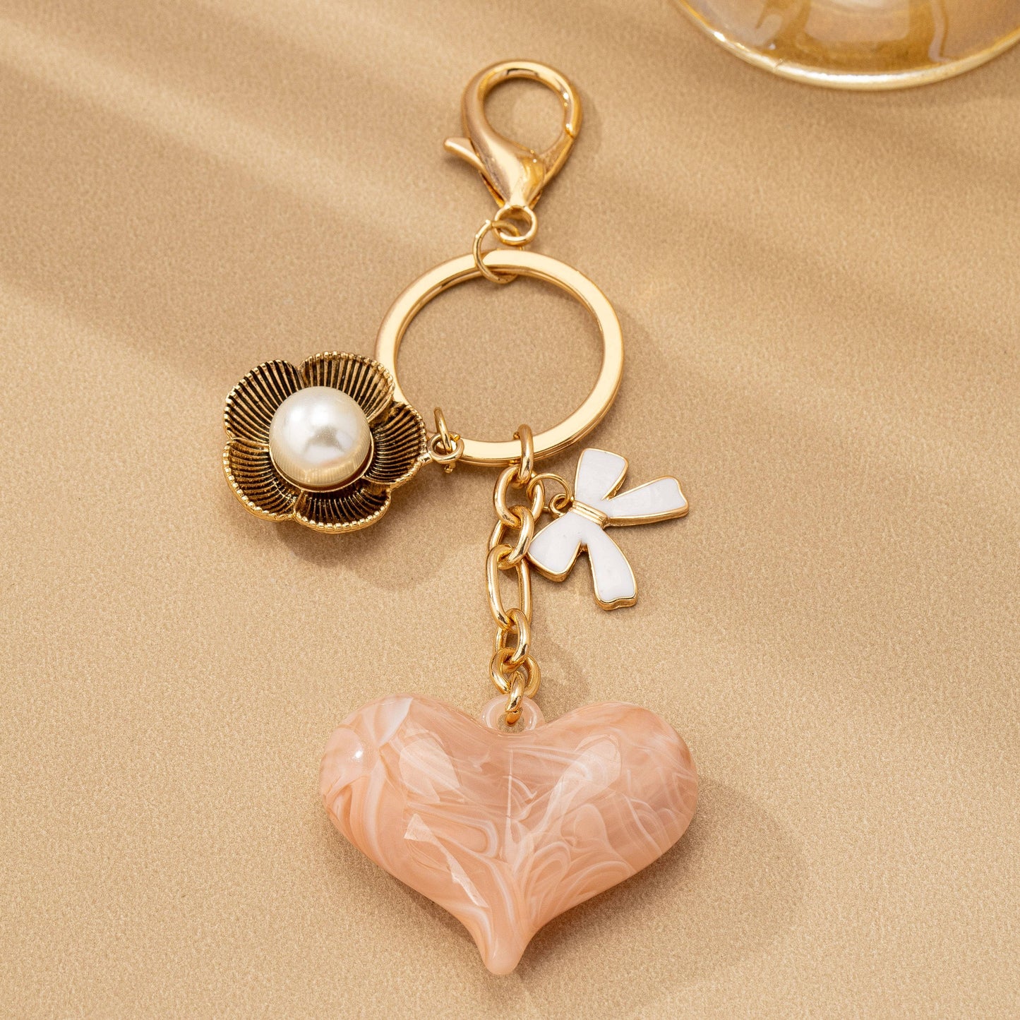BAG CHARM KEY CHAIN-SWIRL HEART
