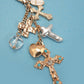 BAG CHARM- WESTERN HEART PEARLIZED CROSS |