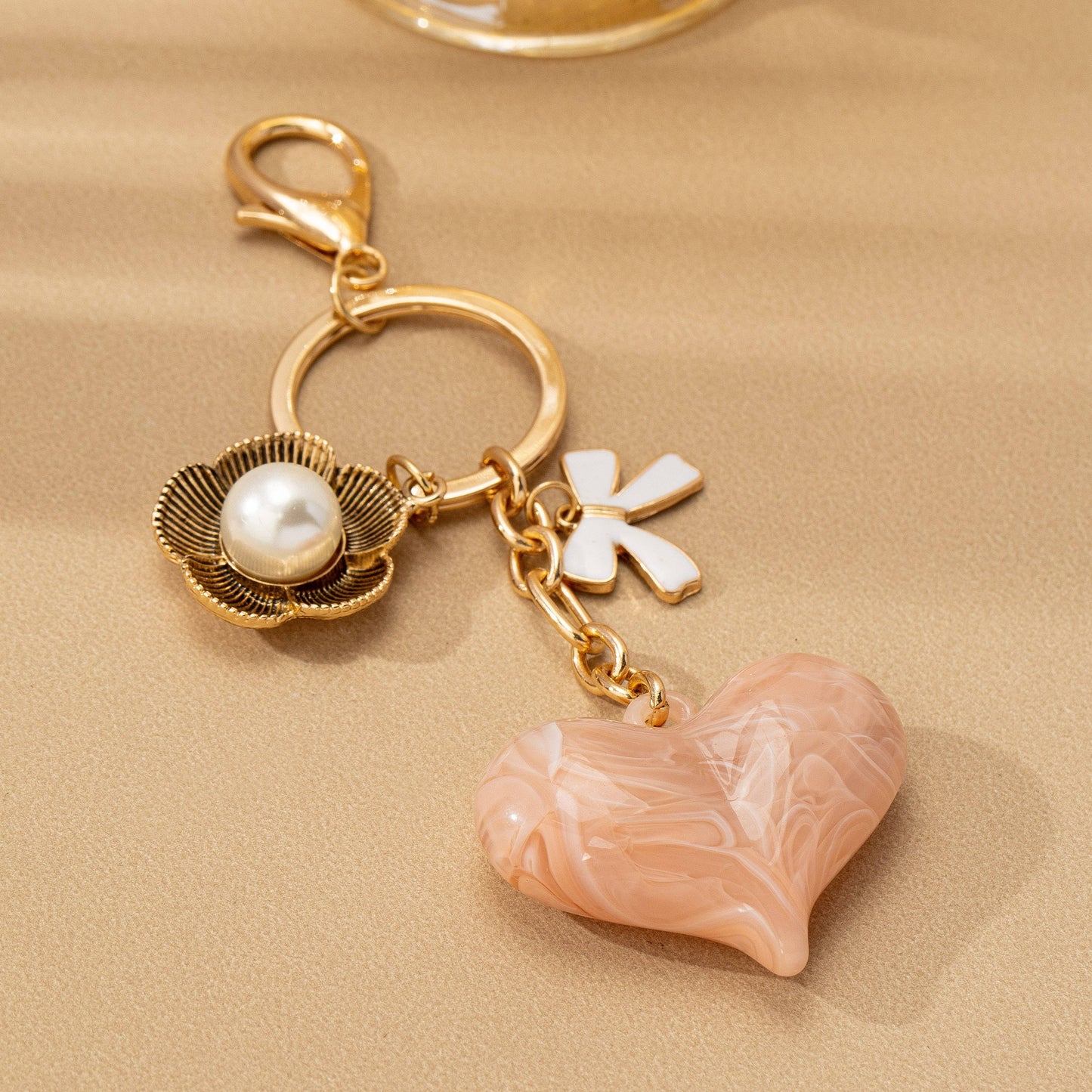 BAG CHARM KEY CHAIN-SWIRL HEART