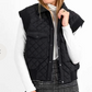 Molly Bracken Vests