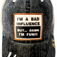 "I'M A BAD INFLUENCE" DISTRESSED TRUCKER HAT: BLING / BLACK